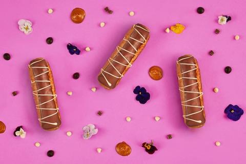 Triple chocolate eclairs on a pink background