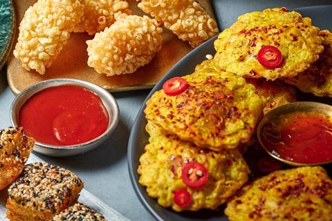 Feta, apricot and harissa pastries on a plate with hot honey dip