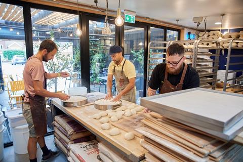 Three bakers working at The Street Bakeshop
