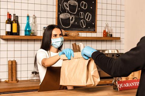 Cafe owner with mask during Covid-19