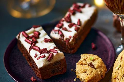 Brownie slices with cream cheese frosting and chocolate curls
