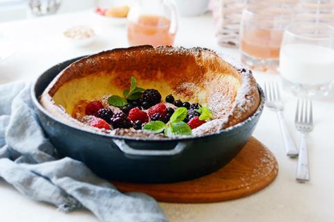 A Dutch baby pancake with berries in the middle