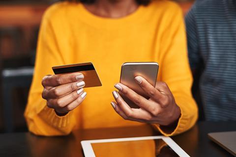 Woman buying something online using her phone