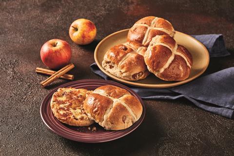 Apple and Cinnamon Hot Cross Buns with apples and cinnamon sticks