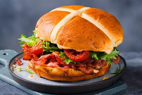 A BLT sandwich with hot cross bun as bread