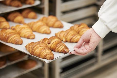 A tray of freshly baked croissants
