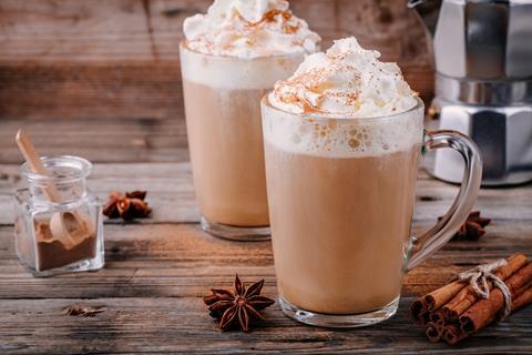 Spiced latte with whipped cream on top