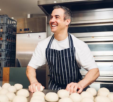 Matt Townley, co-owner Most Bakery, shaping rolls