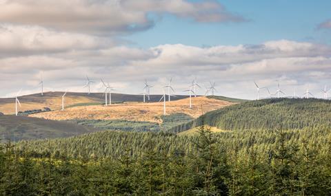 A wind farm amidst beautiful Scottish countryside