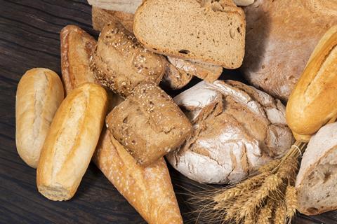 A selection of breads on a wooden board