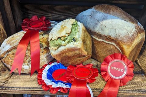 Britain's Best Loaf winners with rosettes