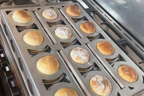 Bread rolls being baked in a specialised mould