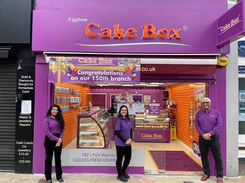 CEO Sukh Chamdal (right) marks the opening of Cake Box's 150th branch with franchisee Sharon Rupra