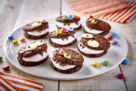 Marshmallow sandwiched between two chocolate cookies