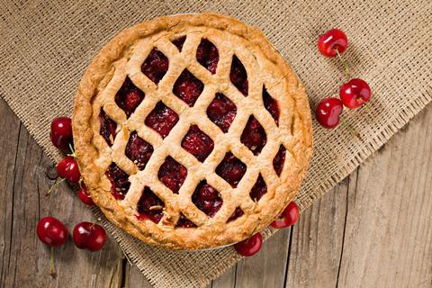 A cherry pie with a lattice pastry top