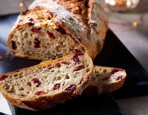A Christmas sourdough loaf with cranberries studded throughout it