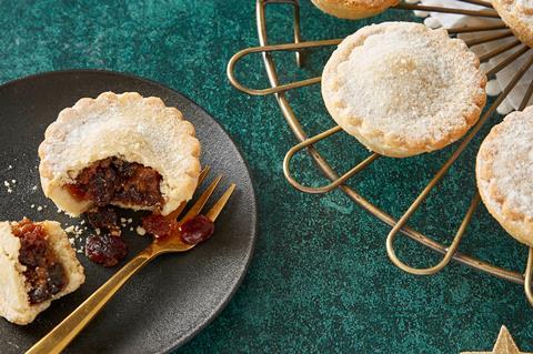 Gin infused mince pies on a green tablecloth