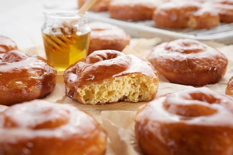 A Donut Honey Brioche Bun made with Dawn Foods brioche concentrate.
