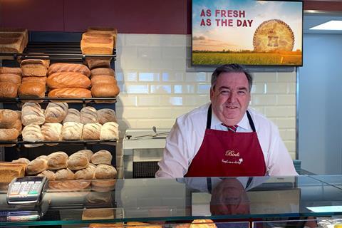Birds Bakery's Mike Holling behind the bakery counter