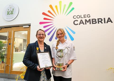 Coleg Cambria - Ella Muddiman is presented with the Hugh Weeks Award by ABST executive committee member Sara Autton