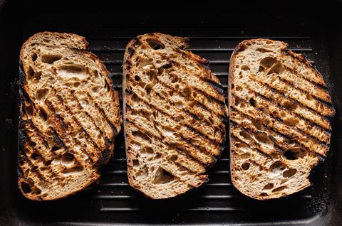 Three slices of grilled sourdough