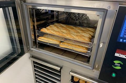 Baguettes being baked in an oven