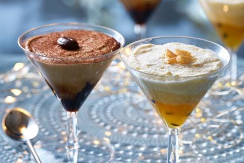 Chocolate and passionfruit desserts in martini glasses