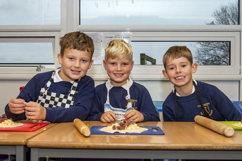 Three boys baking Cornish pasties