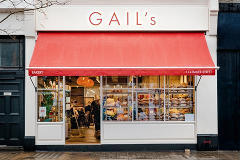 Outside a Gail's Bakery on Baker Street, London with its iconic red and white colour scheme