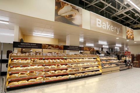 Asda in store bakery with loaves on shelves