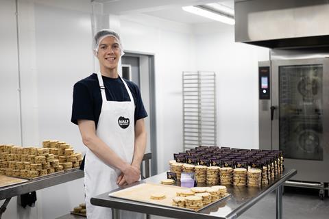 Half the Story - A worker produce biscuits at the new Nottingham production site