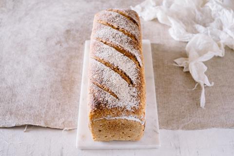 A lovely looking sourdough tin loaf with flour on top