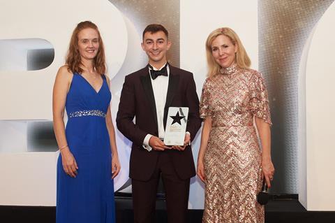 Earth & Wheat founder James Eid (centre) smiles after receiving the Sustainability Initiative of the Year award from Macphie's Yvette Wild (left) and Sally Phillips