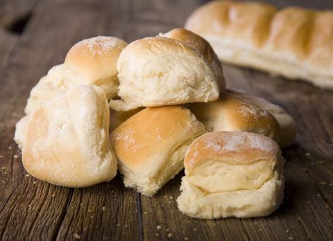 White bread rolls on a wooden background