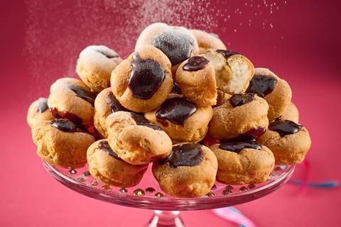 Profiteroles with chocolate on top