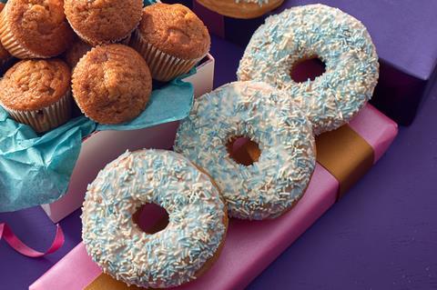 Ring doughnuts with blue and white sprinkles on