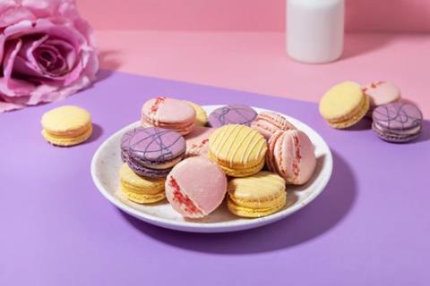 Mademoiselle Macaron pink, purple, and yellow macarons