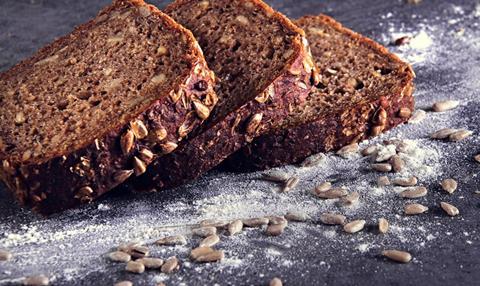 High fibre rye bread on floury surface