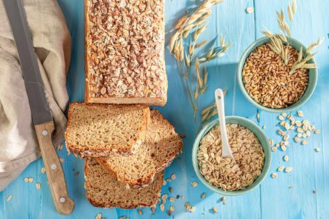 Bran bread with wheat and oats next to it