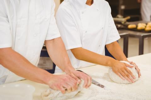 Bakers hands on sourdough