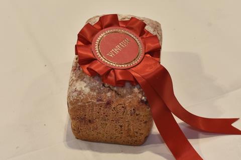 A gluten free beetroot loaf with a rosette on