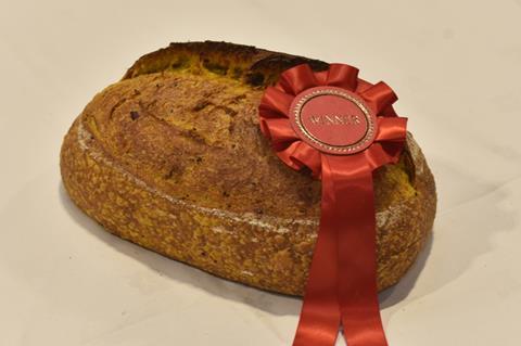 A turmeric, red onion and nigella seed sourdough with rosette on