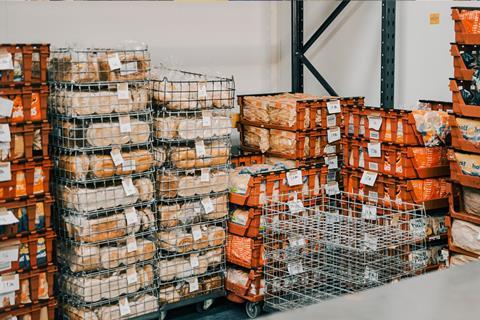Good-to-eat waste bread is stockpiled in a Fareshare warehouse ahead of redistribution via local charities.