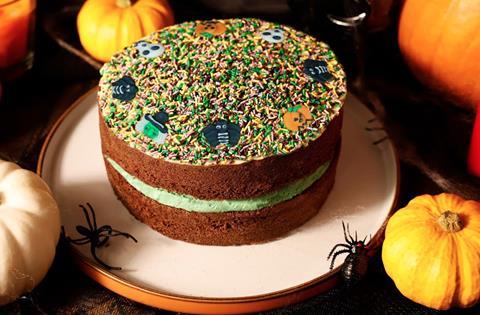 Halloween sponge cake with sprinkles and green buttercream