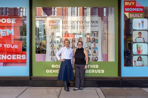 World Foods Market - Buy Women Built founder Sahar Hashemi OBE (left) and World Foods Market UK executive leader of purchasing Jade Hoai stand outside the new Kensington store window display