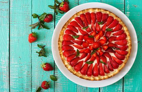 Strawberry tart on a mint green background