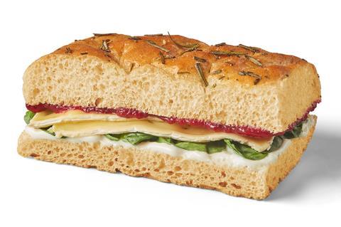 A focaccia with brie and cranberry sauce in