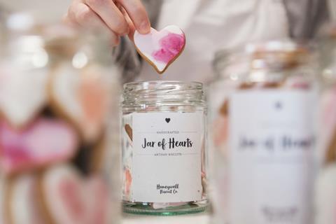 A jar of heart shaped cookies