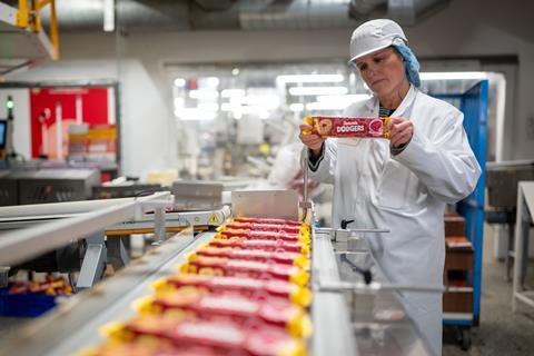 Rebecca Phillips assessing Jammie Dodgers pack