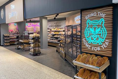 Tesco's new in-store bakery design with neon Tiger light